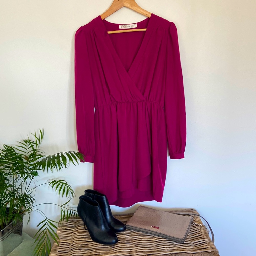 Gorgeous wrap dress, long sleeves and very versatile.